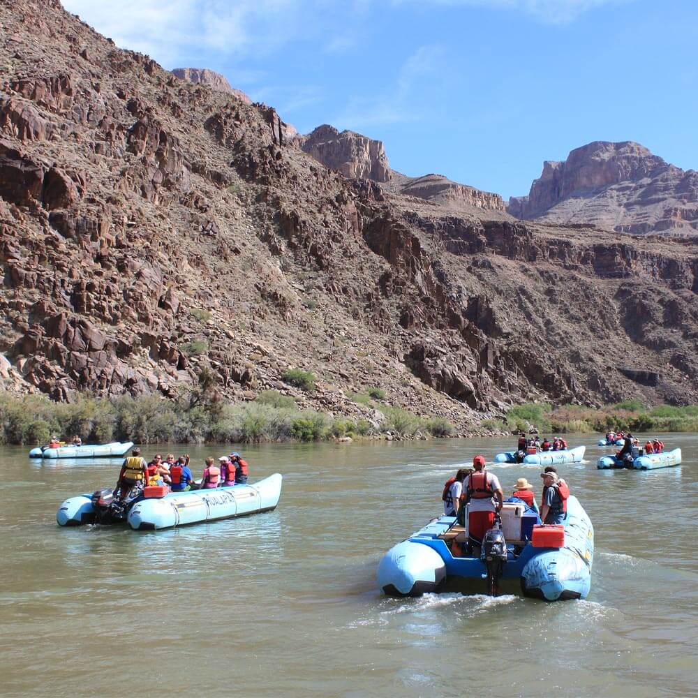 Several Hualapai River Runners boats on Colorado River